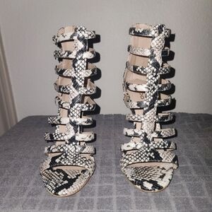 Like new Multi-strap snake skin stilettos